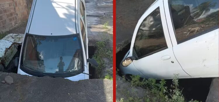 Carro cai em buraco e moradores denunciam histórico de acidentes em bairro de Feira de Santana